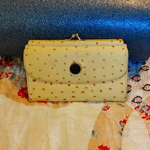 Dooney and Bourke vintage wallet in light yellow,ostrich embossed leather